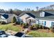 A home with meticulous landscaping, sidewalk leading to front door and parking at 450 Guiness Pl, Rock Hill, SC 29730