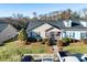 Charming home with landscaped front yard, sidewalk, and ample parking at 450 Guiness Pl, Rock Hill, SC 29730