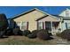Charming single-Gathering home featuring stylish wood textures and attractive landscaping at 450 Guiness Pl, Rock Hill, SC 29730