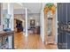 Grand foyer with hardwood floors, high ceilings, and classic grandfather clock at 4522 Long Cove Dr, Denver, NC 28037