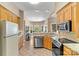 Bright kitchen featuring stainless steel appliances, granite counters, and large windows at 4522 Long Cove Dr, Denver, NC 28037