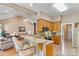 Open kitchen features granite countertops, breakfast bar, and views to the living room at 4522 Long Cove Dr, Denver, NC 28037