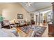 Comfortable living room with vaulted ceiling, hardwood floors, and cozy seating at 4522 Long Cove Dr, Denver, NC 28037