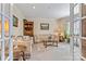 Cozy living room with neutral tones, traditional furnishings, and a decorative area rug at 4522 Long Cove Dr, Denver, NC 28037