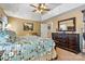 The main bedroom has a large wooden dresser and a view through to the main bathroom at 4522 Long Cove Dr, Denver, NC 28037