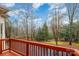 Balcony view showcasing the private backyard and lush trees in a serene setting at 4605 Curraghmore Rd, Charlotte, NC 28210