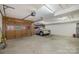 Attached garage with ample space for parking; includes a light-colored SUV at 4605 Curraghmore Rd, Charlotte, NC 28210