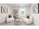Cozy living room featuring comfortable seating and stylish decor providing an inviting atmosphere at 5050 Beargrass Dr, Dallas, NC 28034
