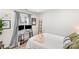 Bedroom with a workspace and a window with gray drapes at 5120 Silabert Ave, Charlotte, NC 28205