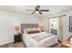 Serene bedroom with a comfortable queen-size bed and a view from the window at 5120 Silabert Ave, Charlotte, NC 28205