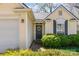 Charming single-Gathering home featuring a well-manicured lawn and inviting front entrance at 5120 Silabert Ave, Charlotte, NC 28205