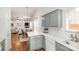 Open concept kitchen featuring modern appliances and a breakfast bar at 5120 Silabert Ave, Charlotte, NC 28205