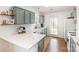 Bright kitchen featuring white countertops, stainless steel appliances, and ample storage space at 5120 Silabert Ave, Charlotte, NC 28205