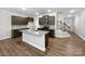 Modern kitchen with stainless steel appliances, granite countertops, and central island at 665 Cypress Glen Ln, Clover, SC 29710