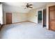 Bright bedroom offers space, an open doorway, and a closet creating a comfortable and inviting atmosphere at 7007 Chapparall Ln, Charlotte, NC 28215