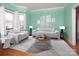 Comfortable living room with stylish decor, a large window, and neutral color scheme at 7007 Chapparall Ln, Charlotte, NC 28215