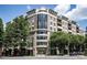 Beautiful exterior of a multi-story building with architectural details at 718 W Trade St # 302, Charlotte, NC 28202