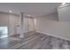 Finished basement with durable flooring and painted trim at 908 Davenport St, Charlotte, NC 28208
