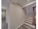 Hallway leading to finished basement space with wooden stairs at 908 Davenport St, Charlotte, NC 28208