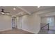 Bright hallway with modern flooring, connecting various rooms and a stairway in the home at 908 Davenport St, Charlotte, NC 28208