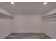 Walk-in closet with shelf storage at 908 Davenport St, Charlotte, NC 28208