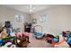 Bright bedroom with carpeted floors, natural light, and ample space for play and relaxation at 9257 Mull Rd, Vale, NC 28168