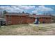 Classic brick home with a covered entry and tidy landscaping at 9257 Mull Rd, Vale, NC 28168