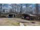 Detached garage and metal carport on a spacious rural property at 9257 Mull Rd, Vale, NC 28168