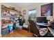 Home office with built-in shelving for storage, a practical workspace and hardwood flooring at 9257 Mull Rd, Vale, NC 28168