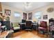 Functional home office setup with natural light, desk space, and hardwood floors at 9257 Mull Rd, Vale, NC 28168