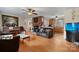 Cozy living room with brick fireplace and hardwood floors at 9257 Mull Rd, Vale, NC 28168