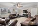 Spacious living room featuring comfortable seating and a ceiling fan, perfect for relaxation and entertainment at 9257 Mull Rd, Vale, NC 28168