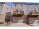 Rear exterior with private balconies and attached garages, offering outdoor relaxation and convenience at 9330 Ainslie Downs St, Charlotte, NC 28273