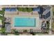 Aerial view of a community pool with lounge chairs and shaded seating areas for residents at 9330 Ainslie Downs St, Charlotte, NC 28273