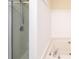 Clean white bathroom with a separate shower and large soaking tub with jets at 102 Brewster Ct, Mooresville, NC 28115