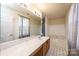 Bright bathroom with a double vanity, lots of counter space, and a separate tub and shower at 102 Brewster Ct, Mooresville, NC 28115
