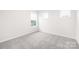 Bedroom with three windows at 149 Saidin Ln, Troutman, NC 28166