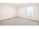 Bedroom with neutral carpet and a window at 149 Saidin Ln, Troutman, NC 28166