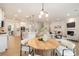 Open concept dining area showcasing the kitchen, living room and staircase at 149 Saidin Ln, Troutman, NC 28166