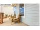 Inviting front porch with comfortable seating, perfect for enjoying the outdoors at 153 Saidin Ln, Troutman, NC 28166