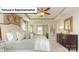 A spacious main bedroom with a tray ceiling, ceiling fan and luxurious furniture at 153 Saidin Ln, Troutman, NC 28166