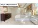 Main bedroom featuring an elegant tray ceiling and neutral color scheme at 153 Saidin Ln, Troutman, NC 28166
