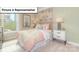 Cozy bedroom with a large window providing natural light, complete with stylish decor and furnishings at 157 Saidin Ln, Troutman, NC 28166