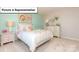 Comfortable bedroom with stylish decor and furnishings, featuring bright walls, soft carpet, and natural light at 157 Saidin Ln, Troutman, NC 28166