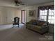 Spacious living room with carpeted floors and a large window at 167 Patterson Rd, Kings Mountain, NC 28086