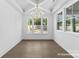 Open dining room featuring modern chandelier and windows at 2019 Mandarin Blvd, Charlotte, NC 28205