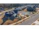 Aerial view showcases the community clubhouse, pool, landscaping, and surrounding neighborhood at 234 Pintail Dr, Monroe, NC 28110