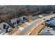 Beautiful aerial view of homes in a community with pond and fountain feature at 234 Pintail Dr, Monroe, NC 28110