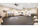 Spacious gym featuring workout equipment, rubber flooring, and ceiling fans at 234 Pintail Dr, Monroe, NC 28110