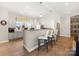 Kitchen with modern appliances, breakfast bar with seating, and ample counter space at 234 Pintail Dr, Monroe, NC 28110